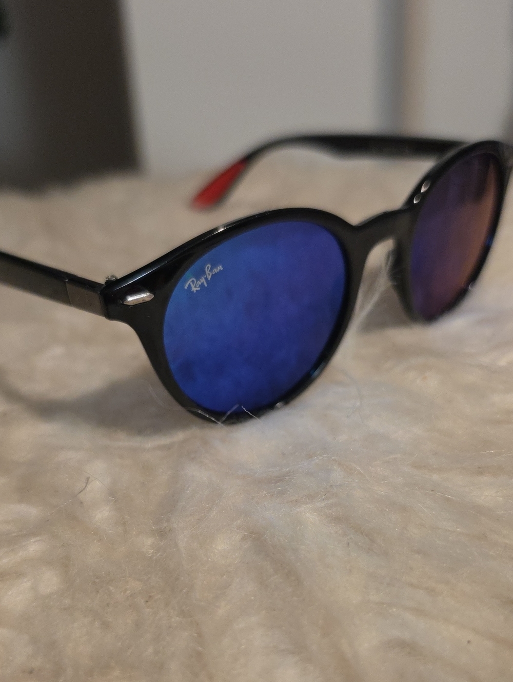 Ray-Ban Black Frame Sunglasses with Blue Mirrored Lenses